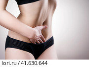 Woman with abdominal pain. Pain in the human body. Стоковое фото, фотограф Станислав Тарко / Фотобанк Лори