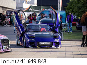 Mazda RX-7, iconic sports car from Japanese manufacturer on auto exhibition. Редакционное фото, фотограф Константин Григорьев / Фотобанк Лори