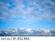 Altocumulus and cumulus clouds on the sky, background, copy space for text. Стоковое фото, фотограф Андрей Журавлев / Фотобанк Лори