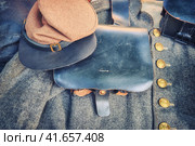 Military uniform of an American soldier during the civil war. Cap, bag and overcoat, close-up. Life of the military in America during the civil war of the North and South in the USA. Стоковое фото, фотограф Андрей Журавлев / Фотобанк Лори