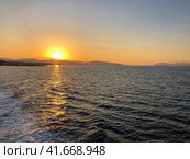 Golden Beautiful sunset at the seaside, Greece. Редакционное фото, фотограф Екатерина Каляева / Фотобанк Лори