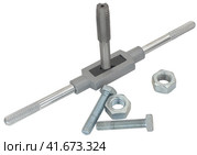 Инструменты для нарезания резьбы, винт и гайки на белом фоне. Instrument for cutting of screw-thread. Стоковое фото, фотограф Татьяна Д / Фотобанк Лори