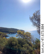 Aerial view over the coastline with view the Agistri island and the mountains of peloponisos.Aegina island, Saronic Gulf,Greece. Редакционное фото, фотограф Екатерина Каляева / Фотобанк Лори