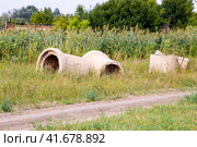The excavated concrete pipes of locks of the irrigation rice system. Стоковое фото, фотограф Леонид Еремейчук / Фотобанк Лори