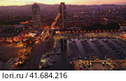 Scenic aerial panoramic view of modern Barcelona cityscape on Mediterranean coast with marina at summer twilight, Spain. Стоковое видео, видеограф Яков Филимонов / Фотобанк Лори