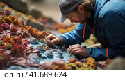 Geographer exploring the terrain on the model. Стоковое AI-изображение, AI-художник Кирилл Черезов / Фотобанк Лори