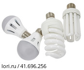 Энергосберегающие лампы E27 на белом фоне. Economy lamps isolated on white background. Стоковое фото, фотограф Татьяна Д / Фотобанк Лори