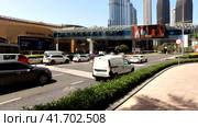 Panoramic view of urban modern business district of Dubai city, UAE. Urban cityscape of street with cars (2023 год). Редакционное видео, видеограф Aleksandr Golubev / Фотобанк Лори