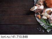 Beef bone and vegetable ingredients for cooking broth. Healthy food with collagen and amino acids. Copy space. Стоковое фото, фотограф Глущенко Елена / Фотобанк Лори