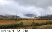 Timelapse with flying clouds enveloping the mountains with swirls. South Ossetia. Caucasus. Стоковое видео, видеограф Юрий Поздников / Фотобанк Лори