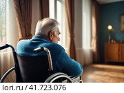 Senior man disabled sitting alone in wheelchair looking through window at hospital, lonely elder thoughtful sad old man look outside in bedroom at retirement home, feel depressed lonely. AI. Стоковое AI-изображение, AI-художник Sergey Grishin / Фотобанк Лори