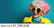 An elderly beautiful woman with bright dyed hair and sunglasses. Generated by AI. Стоковое AI-изображение, AI-художник Ярославский Максим / Фотобанк Лори