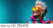 An elderly beautiful woman with bright dyed hair and sunglasses. Generated by AI. Стоковое AI-изображение, AI-художник Ярославский Максим / Фотобанк Лори