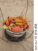 Sale of cooked seafood on the beach in Nha Trang (2014 год). Стоковое фото, фотограф Олег Жуков / Фотобанк Лори