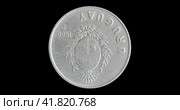 Монета Уругвая 1 песо 1980, аверс на черном фоне. Obverse of Uruguay coin 1 peso 1980, isolated in black background. Close up view. Стоковая анимация, аниматор Александр Кузнецов / Фотобанк Лори