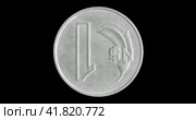 Монета Уругвая 1 песо 1980, реверс на черном фоне. Reverse of Uruguay coin 1 peso 1980, isolated in black background. Close up view. Стоковая анимация, аниматор Александр Кузнецов / Фотобанк Лори