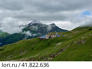 Houses on a green slope and cable car. Dombay, Karachay-Cherkessia, Russia. Стоковое фото, фотограф Владимир Глинский / Фотобанк Лори