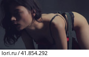 Young woman having sexual punishment with whip on BDSM bench. Стоковое видео, видеограф Гурьянов Андрей / Фотобанк Лори