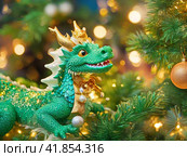 A cute green dragon, a symbol of the New Year according to the eastern calendar, near the Christmas tree. Christmas tree decoration. Festive atmosphere of the New Year, blurred background of multi-colored lights. Стоковое AI-изображение, AI-художник Сергей Елизарьев / Фотобанк Лори