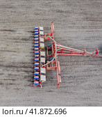 Corn seeder. Sowing on the field with a seeder of corn. Стоковое фото, фотограф Леонид Еремейчук / Фотобанк Лори