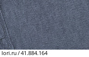 Soft Knitted Woolen Detailed Texture. Natural Fabric Closeup Knit Pattern. Gray Knitwear, Warm Cashmere Surface. Rotation, Macro. Cozy Textile Background. Clothes Production. Melange Yarn. 4K Shot. Стоковое видео, видеограф Марина Демидюк / Фотобанк Лори
