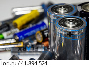 Salt and alkaline batteries, source of energy for portable technology. AAA and AA batteries. Стоковое фото, фотограф Леонид Еремейчук / Фотобанк Лори