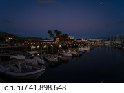 PLAYA BLANCA, LANZAROTE - OCTOBER 25, 2023: Evening on Marina Rubicon of Playa Blanca. Playa Blanca is the southernmost town of the Spanish island of Lanzarote. It is the newest resort on the island. Редакционное фото, фотограф Sergey Kohl / Фотобанк Лори