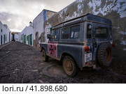 TEGUISE (village), LANZAROTE, CANARY ISLANDS - OCTOBER 26, 2023: Short-wheelbase Land Rover series III on the streets of the historic center of the village Teguise. Редакционное фото, фотограф Sergey Kohl / Фотобанк Лори