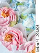 Zephyr bouquet of flowers in a gift box on a light background. Zephyr with a minimum amount of sugar. a natural product. Стоковое фото, фотограф Ирина Ручушкина / Фотобанк Лори