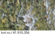 Vertical video of water and stones of Altai river Bashkaus. The camera looks down and moves along the river. Стоковое видео, видеограф Сергей Пристяжнюк (Serg Zastavkin) / Фотобанк Лори