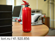 Extinguisher in the office for fire prevention and fire safety. Стоковое фото, фотограф Светлана Акифьева / Фотобанк Лори