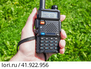 Portable radio transceiver in hand. Стоковое фото, фотограф FotograFF / Фотобанк Лори