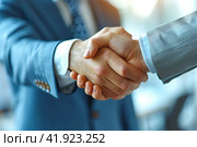Close-up of two businessmen shaking hands after completing a deal. AI generated. Стоковое AI-изображение, AI-художник Ольга Губская / Фотобанк Лори