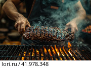 Gaucho cooking the meat on the fire, making the barbecue on the coals, Photos and menus of cafes and restaurants, Magazines. Стоковое AI-изображение, AI-художник Ирина Ручушкина / Фотобанк Лори