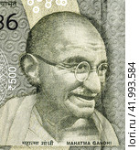 Mahatma Gandhi (1869-1948). Portrait from indian rupee banknote. Стоковое фото, фотограф FotograFF / Фотобанк Лори
