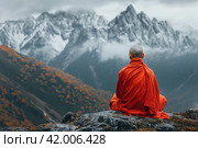 Buddhist monk meditate while sitting on the rock in the mountains. Стоковое AI-изображение, AI-художник Евгений Харитонов / Фотобанк Лори