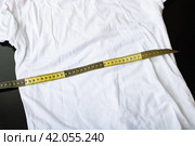 Measuring tape on white fabric close up. Стоковое фото, фотограф Аксенова Вера / Фотобанк Лори