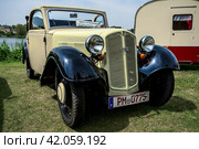 WERDER (HAVEL), GERMANY - MAY 20, 2023: The sub compact car DKW F5 K Reichsklasse, 1936. Oldtimer - Festival Werder Classics 2023. Редакционное фото, фотограф Sergey Kohl / Фотобанк Лори