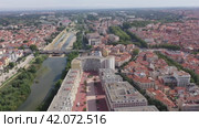 Panoramic view of Perpignan city center and Tet river on sunny day, France. Стоковое видео, видеограф Яков Филимонов / Фотобанк Лори