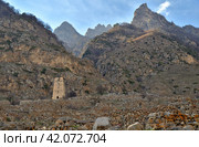 Abaev Tower, defensive structure of late Middle Ages in village of Kyunnyum, destroyed after deportation of Balkar people in spring, village of Upper Balkaria, Kabardino-Balkarian Republic, Russia (2023 год). Стоковое фото, фотограф Алексей Антипов / Фотобанк Лори