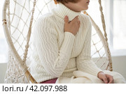 Sore throat and cough, woman with pain in neck at home. Стоковое фото, фотограф Станислав Тарко / Фотобанк Лори