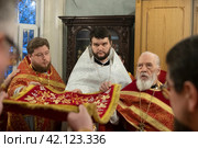 Хиротония диакона Леонида Вадимовича Певень во пресвитера в Николо-Архангельском храме Балашихи (2024 год). Редакционное фото, фотограф Дмитрий Неумоин / Фотобанк Лори