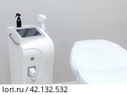 Laser hair removal treatment. Clinic skin care procedure. Medical dermatology photo equipment. People epilation device. Cosmetology technology salon epilation. Body aesthetic concept. Стоковое фото, фотограф Ирина Михайличенко / Фотобанк Лори