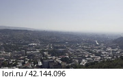 Panorama of the city center from the highest Mtatsminda mountain. Tbilisi. Georgia. 04.09.23 (2024 год). Редакционное видео, видеограф Ярославский Максим / Фотобанк Лори