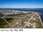 Aerial view of Tavayvaam village (on the right) and Anadyr city (on the left behind the Kazachka river). Chukotka settlements in the far north of Russia. Anadyr estuary and vast expanses of Siberia. Стоковое фото, фотограф Андрей Степанов / Фотобанк Лори