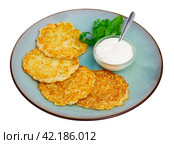 Potato pancakes served with sour cream. Стоковое фото, фотограф Яков Филимонов / Фотобанк Лори