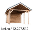 A small wooden utility room with a canopy made of wood. Стоковое фото, фотограф Siarhei Starastau / Фотобанк Лори