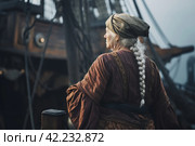 Pirate old woman aboard pirate ship. Generate Ai. Стоковое AI-изображение, AI-художник Иван Рябоконь / Фотобанк Лори