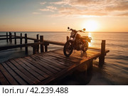 Motorcycle sea sunset horizont. Generate Ai. Стоковое AI-изображение, AI-художник Иван Рябоконь / Фотобанк Лори