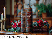 Creeds at the Communion Service: The Cross and Sacred Texts as the Basis of Spiritual Perfection and Understanding. Стоковое AI-изображение, AI-художник Юрий Поздников / Фотобанк Лори